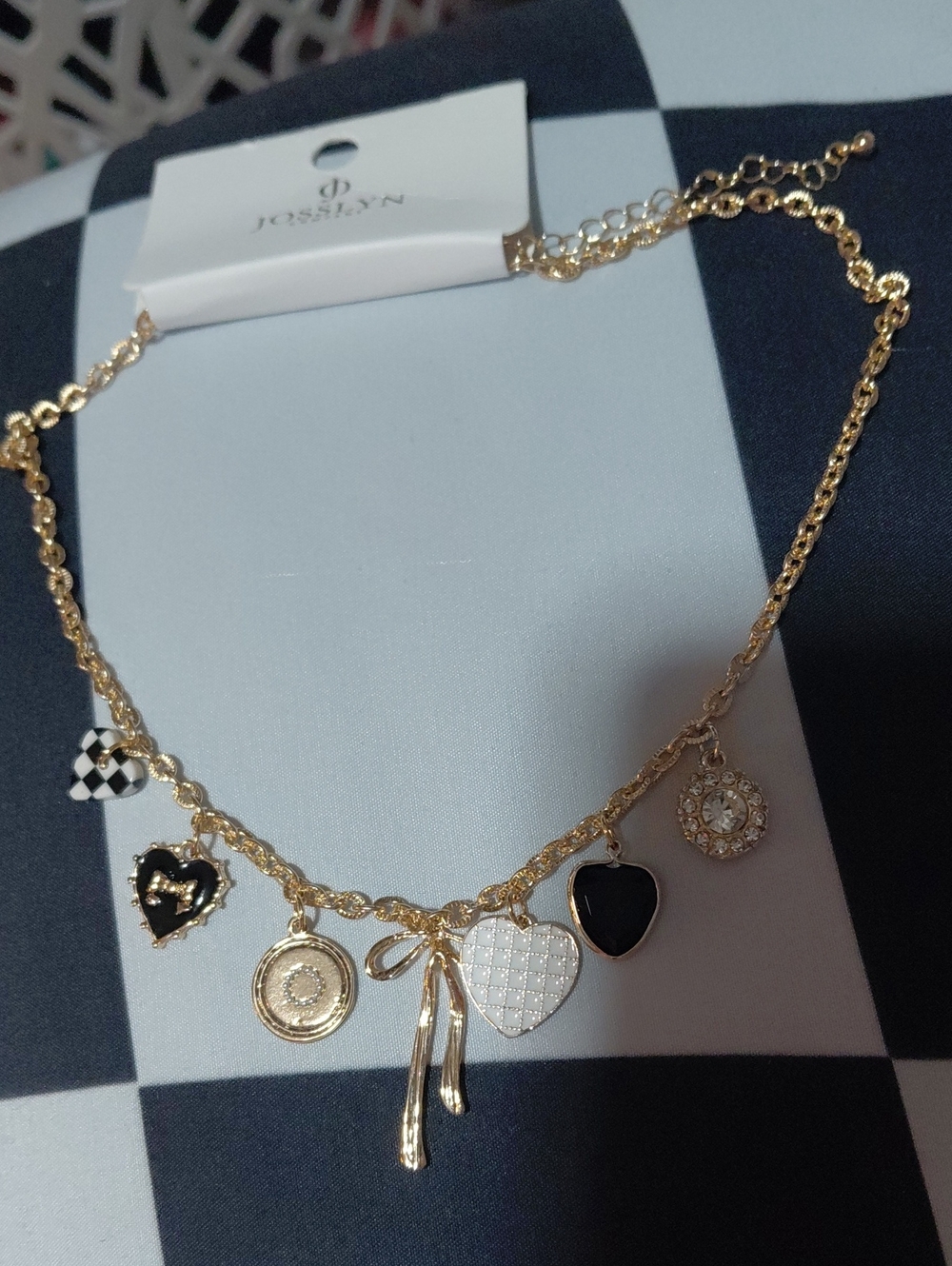 Gold-Tone Heart Charm Necklace with Black and White Accents